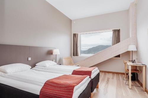 Ένα ή περισσότερα κρεβάτια σε δωμάτιο στο Wood Hotel by Frich's
