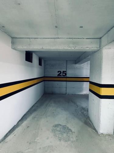 an empty parking garage with at Priam Apartment in Pristina