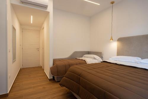 Postel nebo postele na pokoji v ubytování TOLEDO3