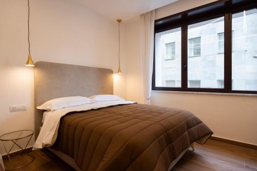 Postel nebo postele na pokoji v ubytování TOLEDO3