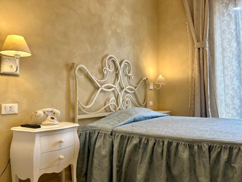 Postel nebo postele na pokoji v ubytování Boutique Hotel Calais Milano