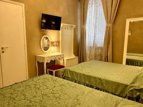Postel nebo postele na pokoji v ubytování Boutique Hotel Calais Milano
