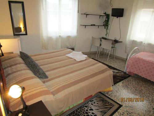 Postel nebo postele na pokoji v ubytování San Marco
