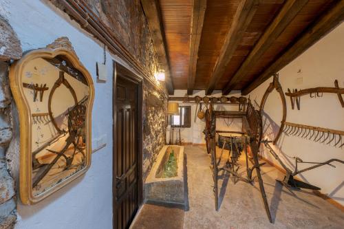 a hallway with antlers on the walls of a house at CASA RURAL VICENTA 1750 in Albentosa