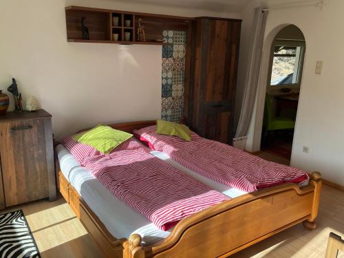 Una cama o camas en una habitación de TOM’s Appartment