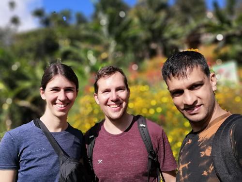 a group of three men standing next to each other at Super View Home Stay in Ella