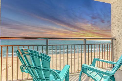 two chairs on a balcony with the beach at Landmark 830 in Myrtle Beach