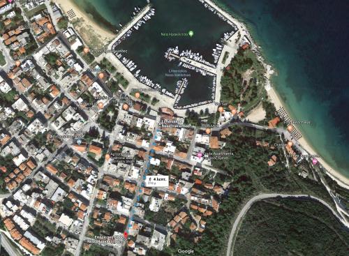 a map of a city next to the water at Memories... in Iraklitsa