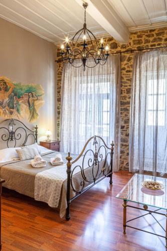 Ένα ή περισσότερα κρεβάτια σε δωμάτιο στο Althaia Pension