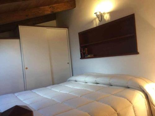 A bed or beds in a room at Il Convento Alghero