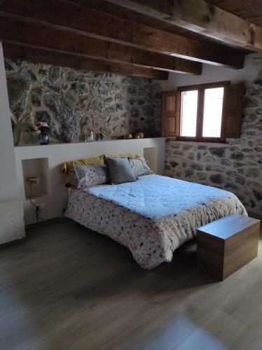 A bed or beds in a room at Casa Puri