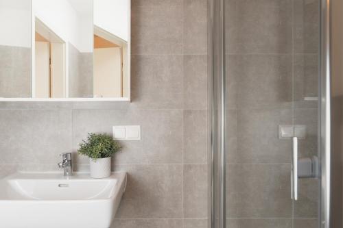 Ванная комната в Kaiser Apartments - Wohnpark Graz-Gösting