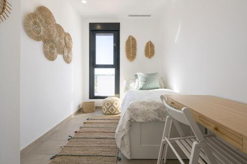 Ένα ή περισσότερα κρεβάτια σε δωμάτιο στο The Sunset House - Punta Candor Beach
