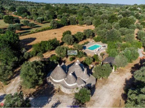 Photo de la galerie de l'établissement Trullo Antico con piscina indipendente - Trulli Finisterrae, à Ceglie Messapica
