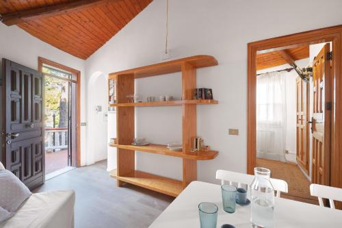 a dining room with a table and a window at Solemar Sicilia - Residence Mer et Soleil in Bagheria