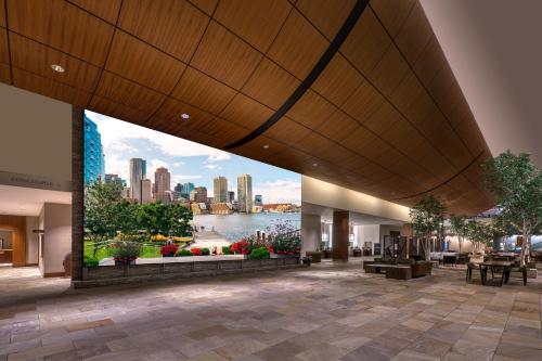 einen Blick auf die Stadt von der Lobby eines Gebäudes in der Unterkunft The Westin Boston Seaport District in Boston