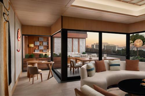 a rendering of a living room with a view of the city at The Ritz-Carlton, Istanbul at the Bosphorus in Istanbul