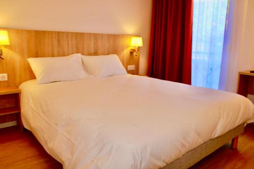 Cama o camas de una habitación en Aux Lys de Chablis