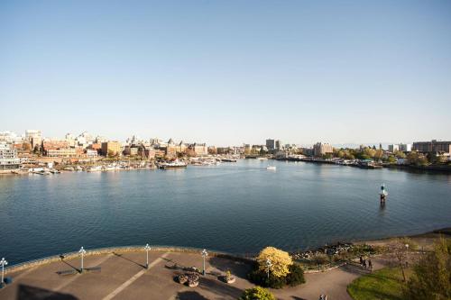 a view of a river with a city in the background at Delta Hotels by Marriott Victoria Ocean Pointe Resort in Victoria