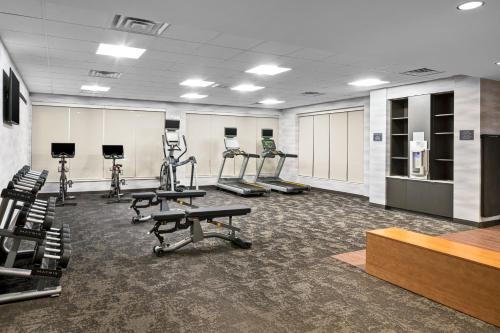 a gym with several treadmills and exercise bikes at Fairfield by Marriott Inn & Suites Somerset in Somerset