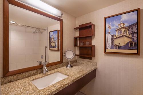 a bathroom with a sink and a mirror at Sheraton Boston Hotel in Boston