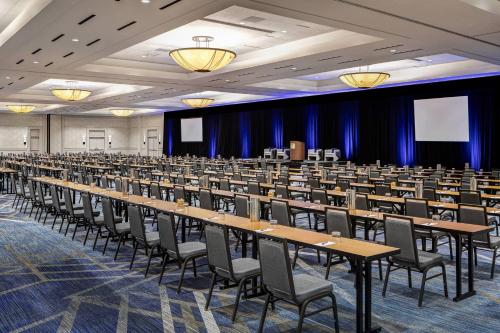 a large banquet hall with tables and chairs at The Woodlands Waterway Marriott Hotel and Convention Center in The Woodlands