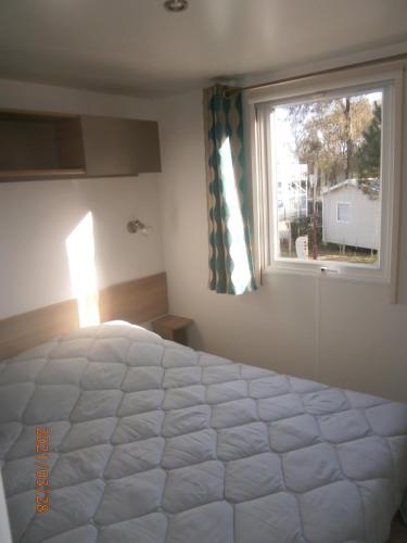 Posteľ alebo postele v izbe v ubytovaní Mobilhome 3 chambres tout confort, proche de la plage