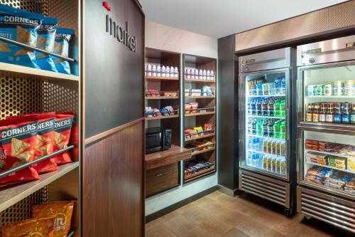 a refrigerator filled with lots of food at Courtyard Denver Southwest/Lakewood in Lakewood