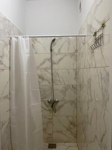 Ein Badezimmer in der Unterkunft Сідус