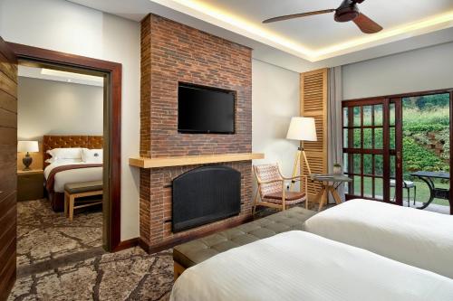 Katil atau katil-katil dalam bilik di Irene Country Lodge, Autograph Collection