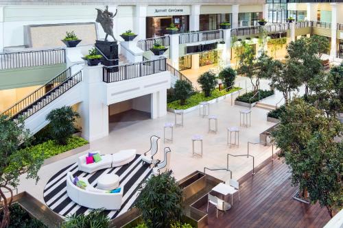 an overhead view of a shopping mall with tables and chairs at Dallas Marriott Downtown in Dallas