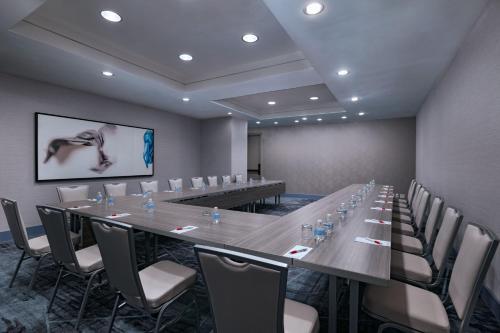 a large conference room with a long table and chairs at Dallas Marriott Downtown in Dallas