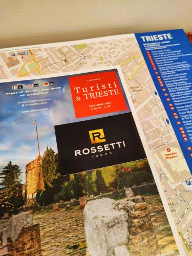 Rossetti Roomsに飾ってある許可証、賞状、看板またはその他の書類