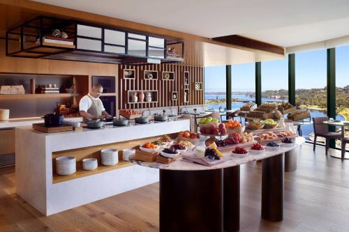a buffet in a hotel with food on a table at The Ritz-Carlton, Perth in Perth