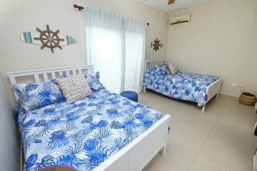 Postel nebo postele na pokoji v ubytování Estrella Home Cabarete