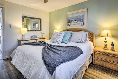 a bedroom with a large bed and two night stands at Brigantine Vacation Rental - Walk to Beach! in Brigantine