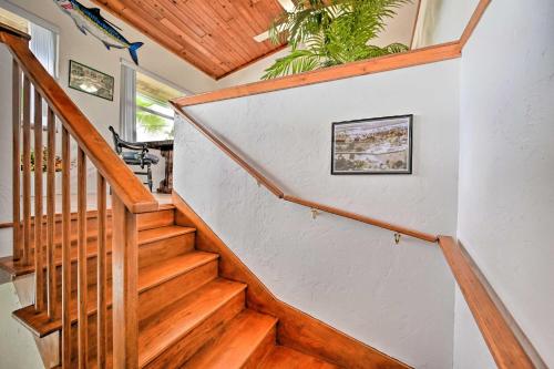a wooden staircase in a home with a wooden ceiling at Everglades Getaway with Deck and Water Views! in Everglades City