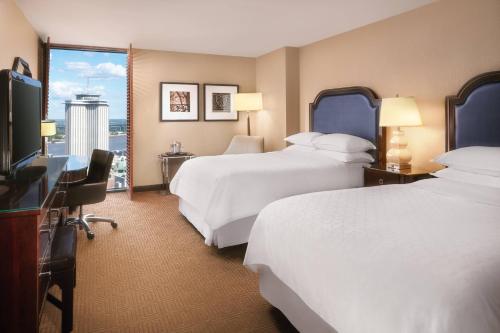 TV a/nebo společenská místnost v ubytování Sheraton New Orleans Hotel