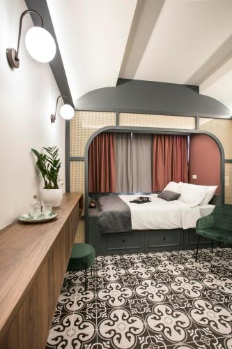 Ένα ή περισσότερα κρεβάτια σε δωμάτιο στο Athens Luxury Rooms II