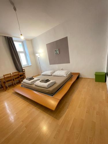 Ένα ή περισσότερα κρεβάτια σε δωμάτιο στο Schloss Belvedere Private Rooms