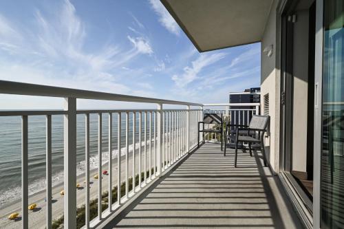 a balcony with a view of the beach at Residence Inn by Marriott Myrtle Beach Oceanfront in Myrtle Beach