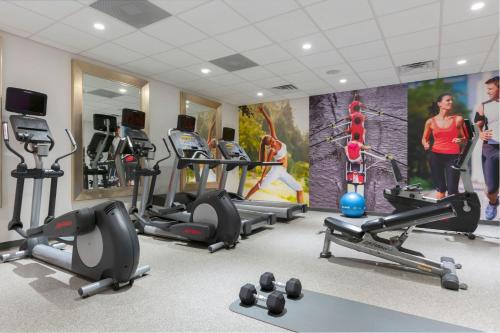a gym with treadmills and exercise equipment in a room at Residence Inn by Marriott Orangeburg in Orangeburg