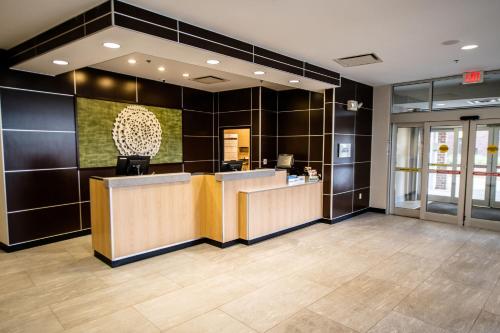 a lobby with a reception desk in a building at Fairfield by Marriott Inn & Suites Washington Casino Area in Washington