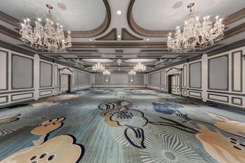 a ballroom with a painting on the floor at The Henry, Autograph Collection in Dearborn