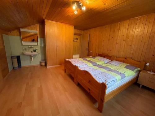Postel nebo postele na pokoji v ubytování Ausserdorf