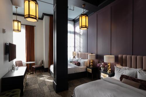 Кровать или кровати в номере Hotel Thaxter