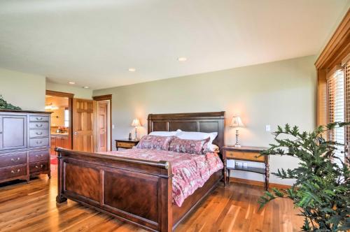 a bedroom with a large bed and two night stands at Custom Home with Decks in Boulder! Gateway to Parks! in Boulder Town