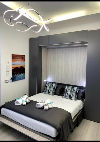 Postel nebo postele na pokoji v ubytování Flat b&b Terry in Ercolano Napoli