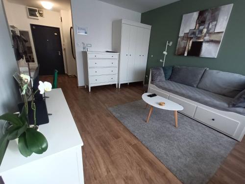 a living room with a couch and a table at NEW - Frendly Luxury Apartment Franka Zagreb in Zagreb