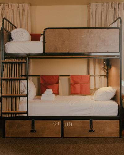 two bunk beds in a dorm room with at KEX Hotel in Portland